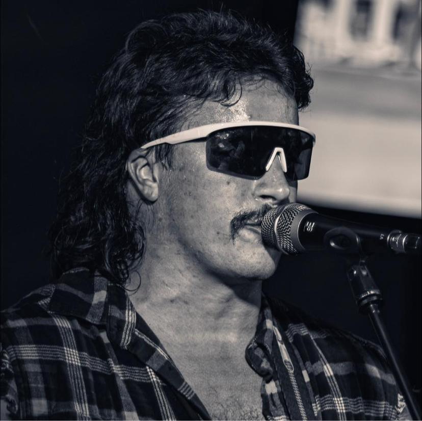 a crowd of people have their phones in their hands with the flashlight on and sing