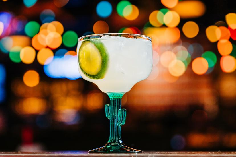 Margarita with twinkle lights in the background.