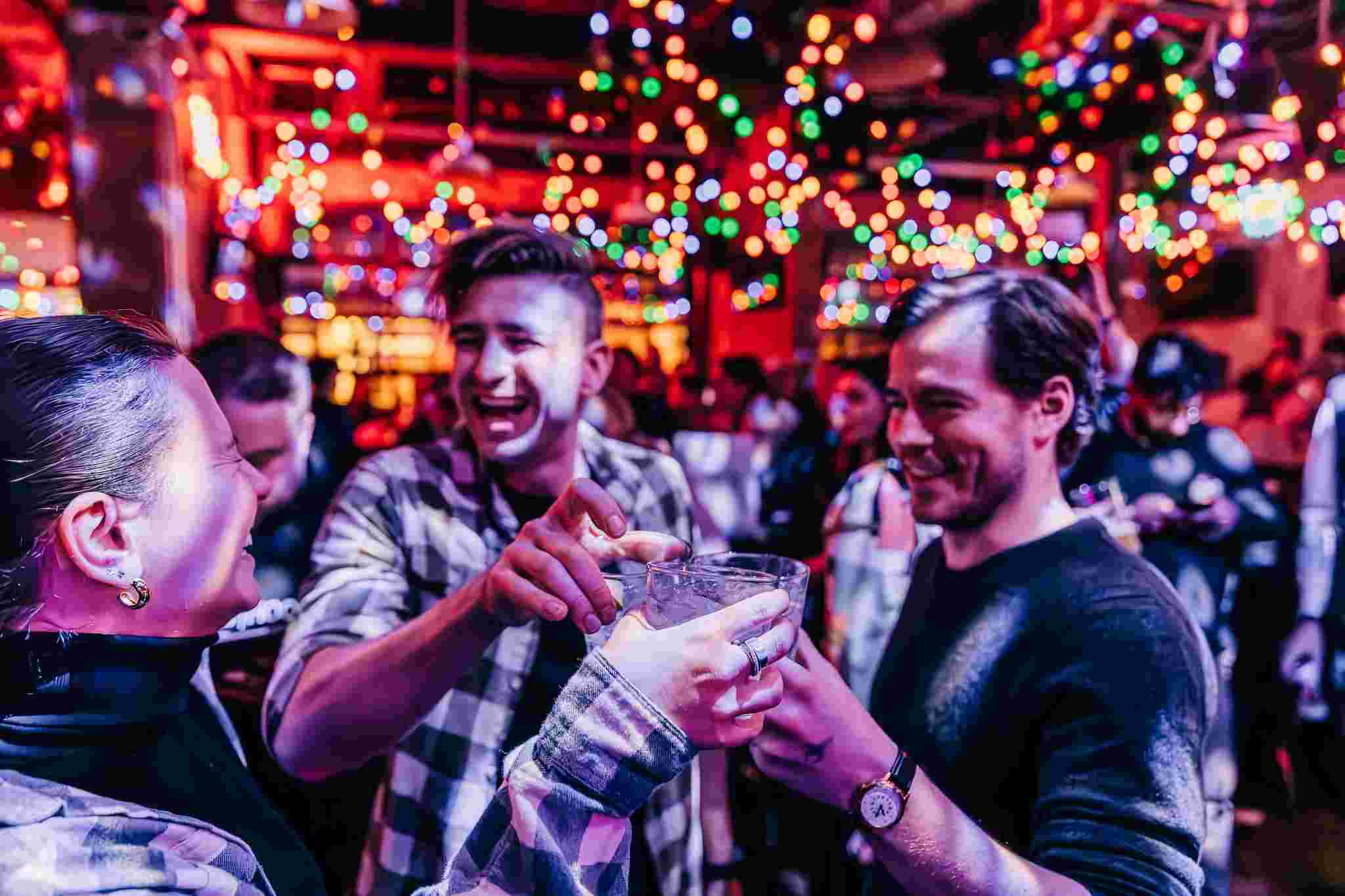 a group of people cheersing!