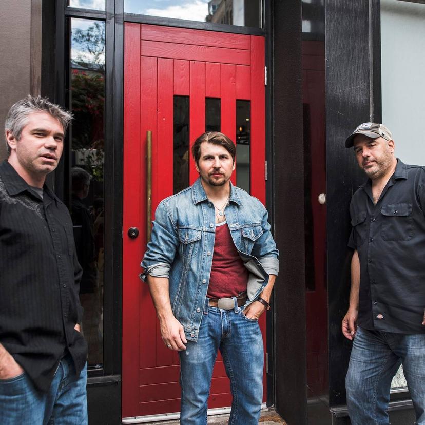 a crowd of people have their phones in their hands with the flashlight on and sing